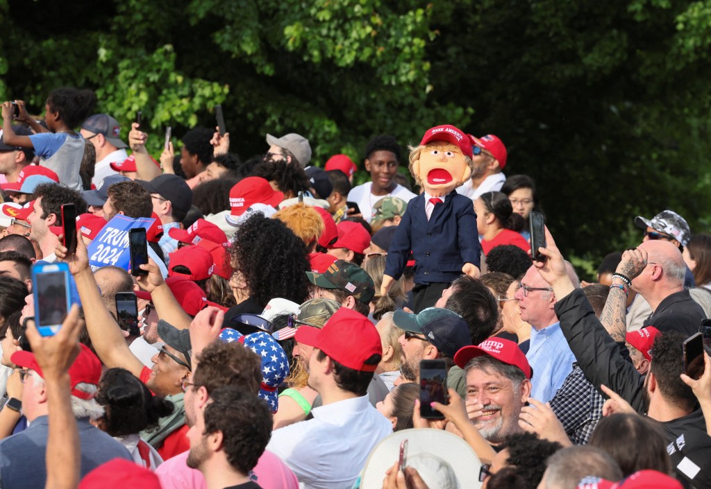 A puppet depicting former U.S. President and Republican presidential candidate Donald Trump is displayed at a campaign rally, at Crotona Park