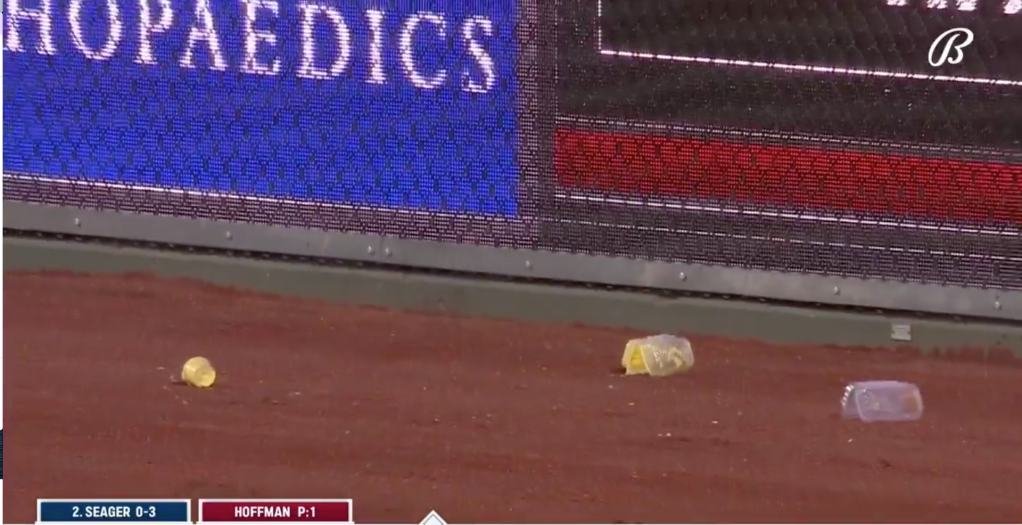 Nacho cheese littered all over the warning track.