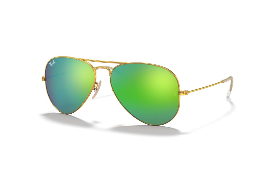 A pair of Ray-Ban sunglasses with green lenses