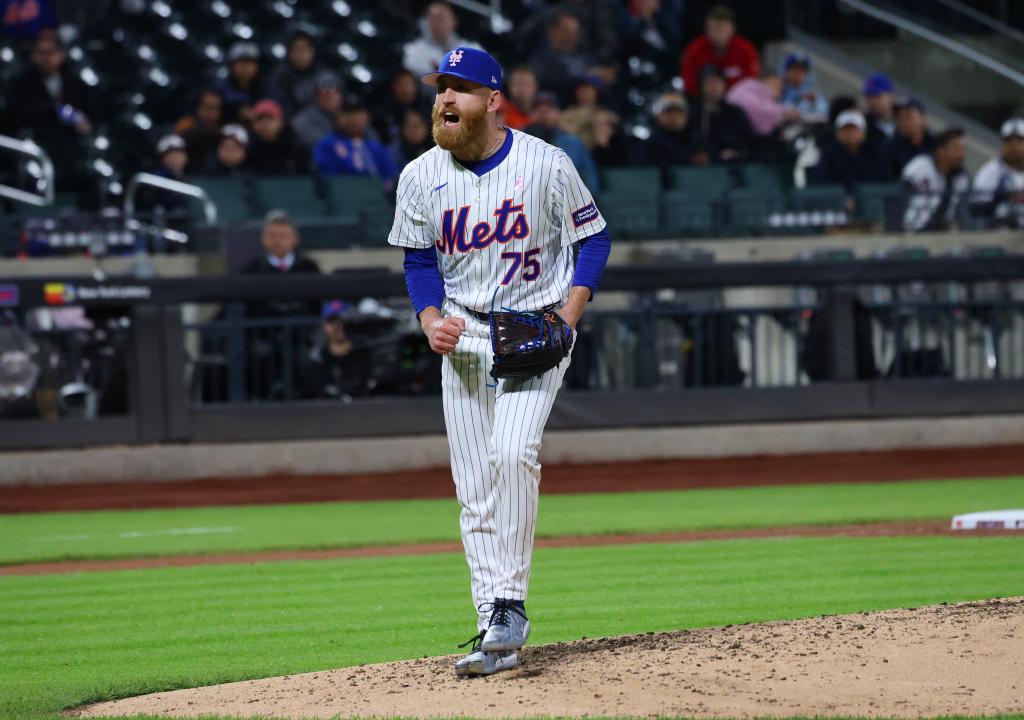 Reed Garrett (75) reacts to getting out of the sixth inning when the New York Mets played the Atlanta Braves.