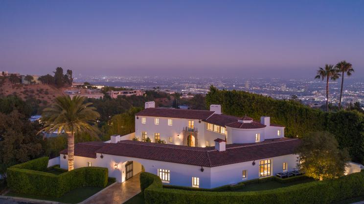A grand LA home built by a retired Grand Prix motorcycle racer lists for $10.49M.
