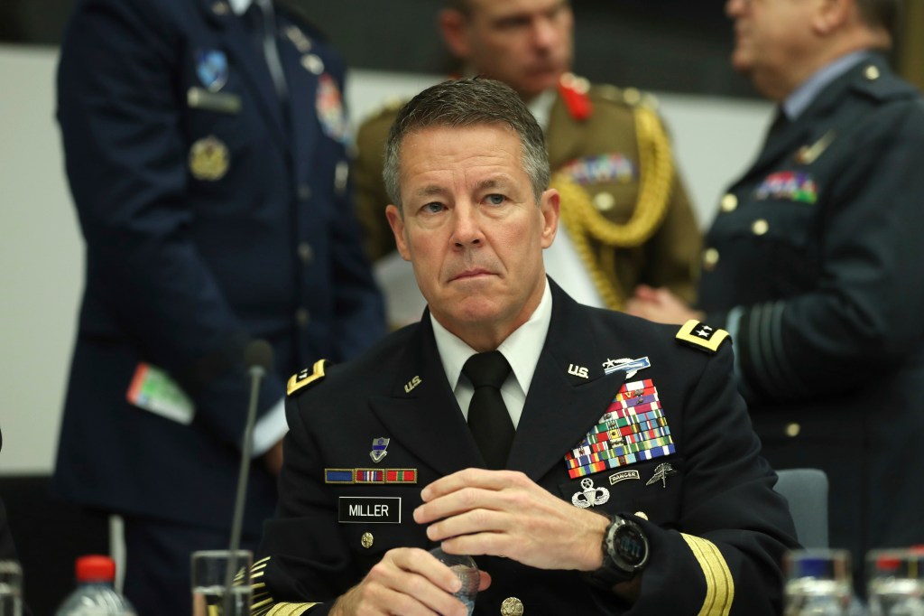 Resolute Support Mission Commander United States Army General Austin Scott Miller waits for the start a meeting of the North Atlantic Council and Resolute Support at NATO headquarters in Brussels, Wednesday, Dec. 5, 2018.