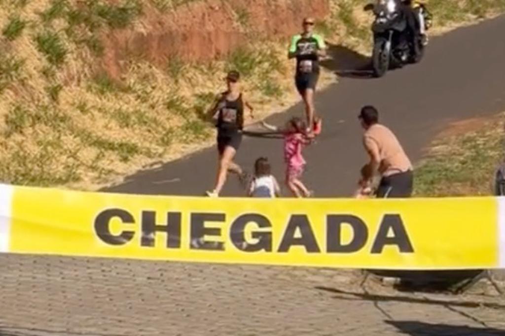 The woman appears to run around her kids.