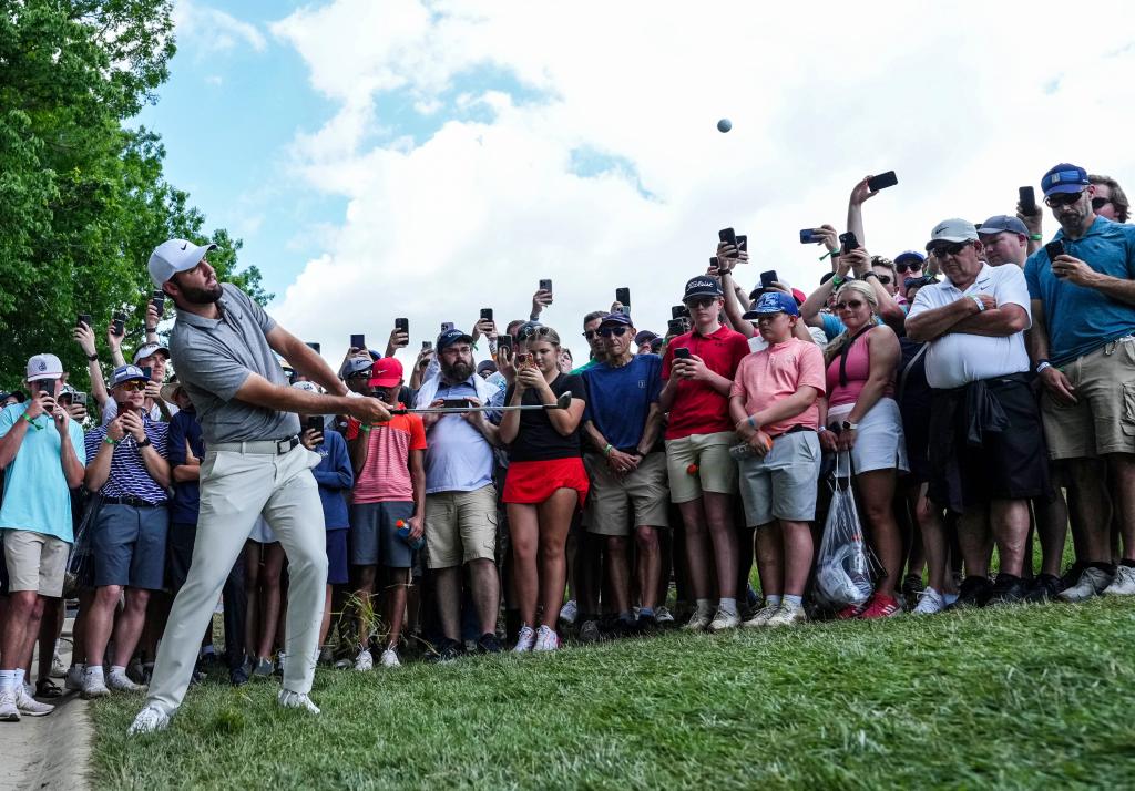 Scottie Scheffler takes a shot on the fourth hole during the third round of the PGA Championship on Saturday.