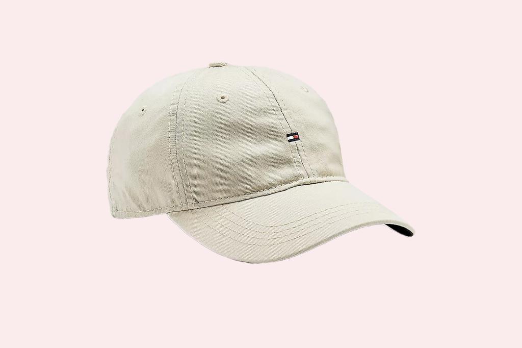Tan baseball cap with a logo on it