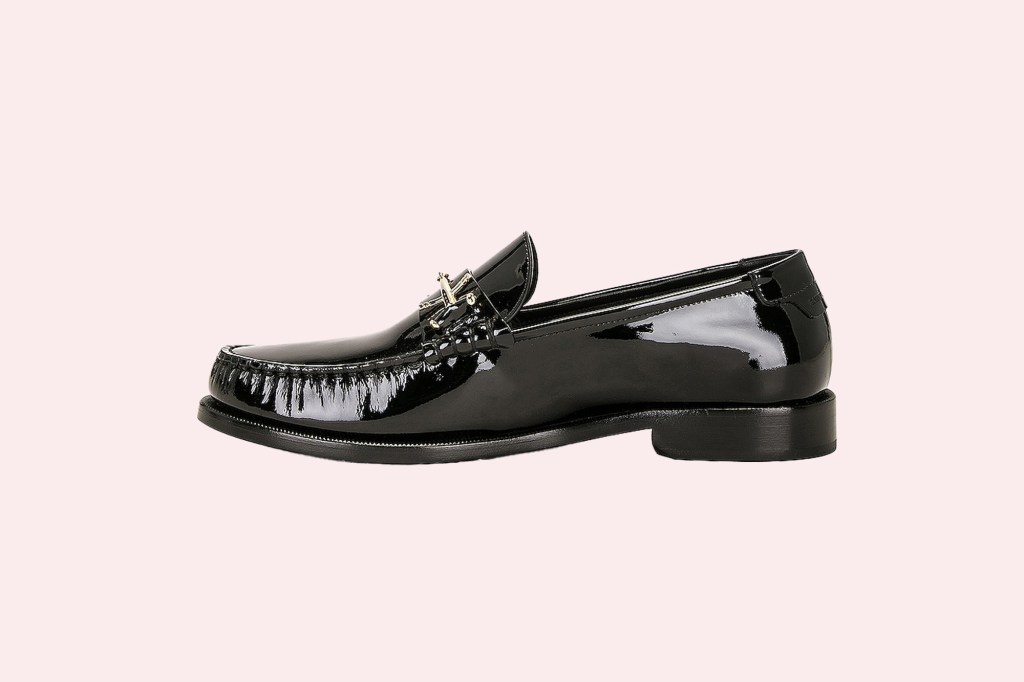 Black shiny loafer with a gold cross on top