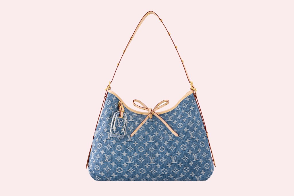 blue purse with a white logo on it