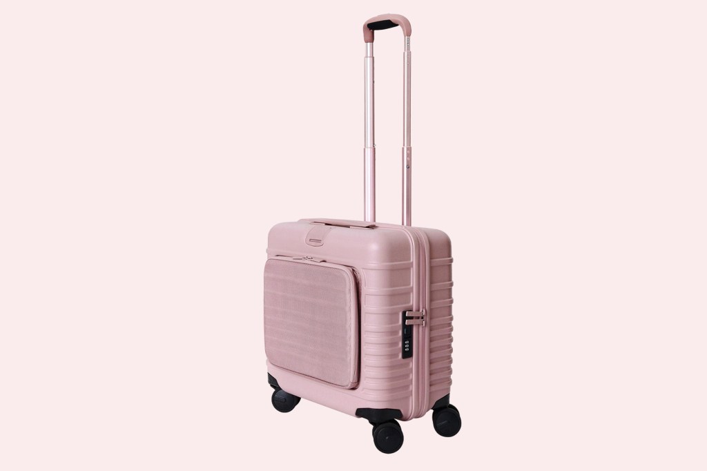 pink suitcase on wheels