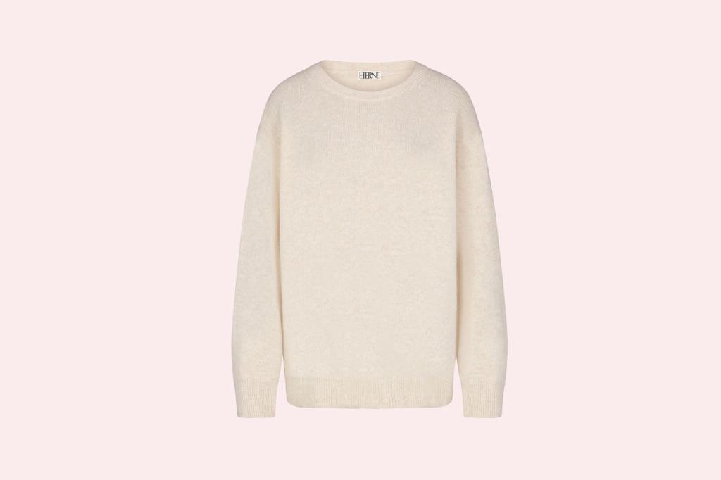 White sweater on a pink background