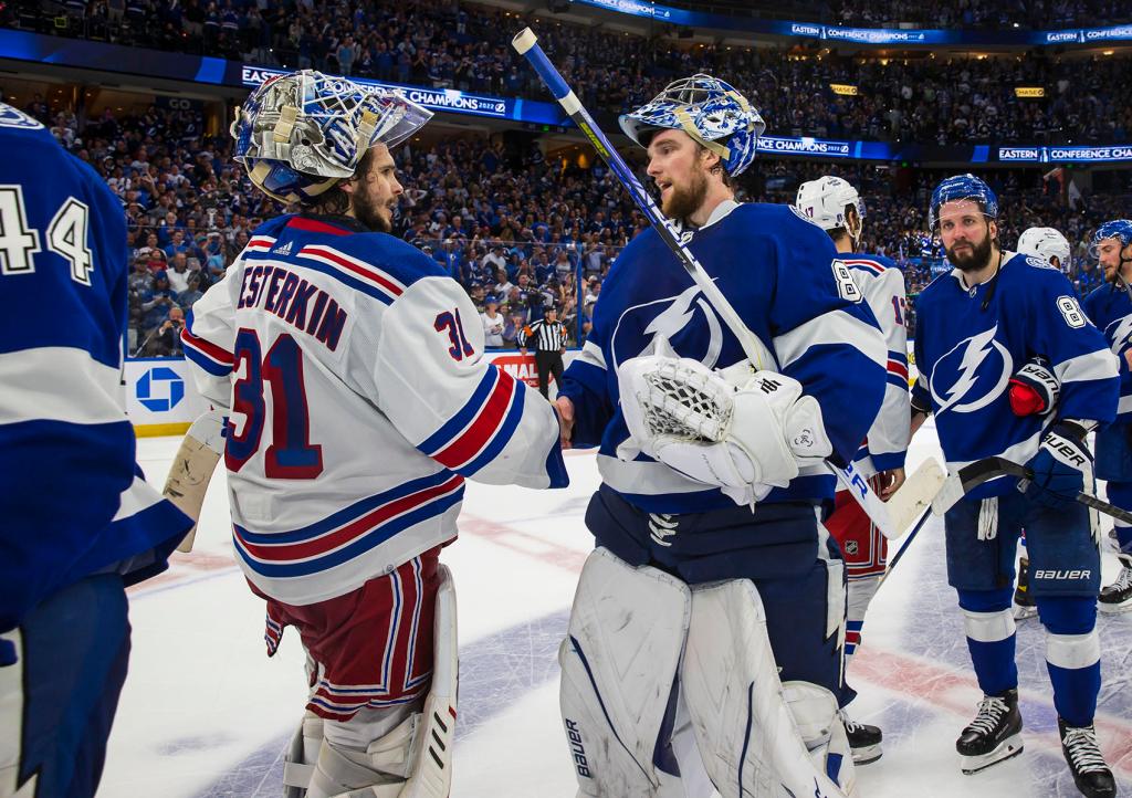 Goalie Andrei Vasilevskiy #88 of the Tampa Bay Lightning shakes hands with Igor Shesterkin #31 of the New York Rangers after Game Six of the Eastern Conference Final of the 2022 Stanley Cup Playoffs at Amalie Arena on June 11, 2022 in Tampa, Florida. 