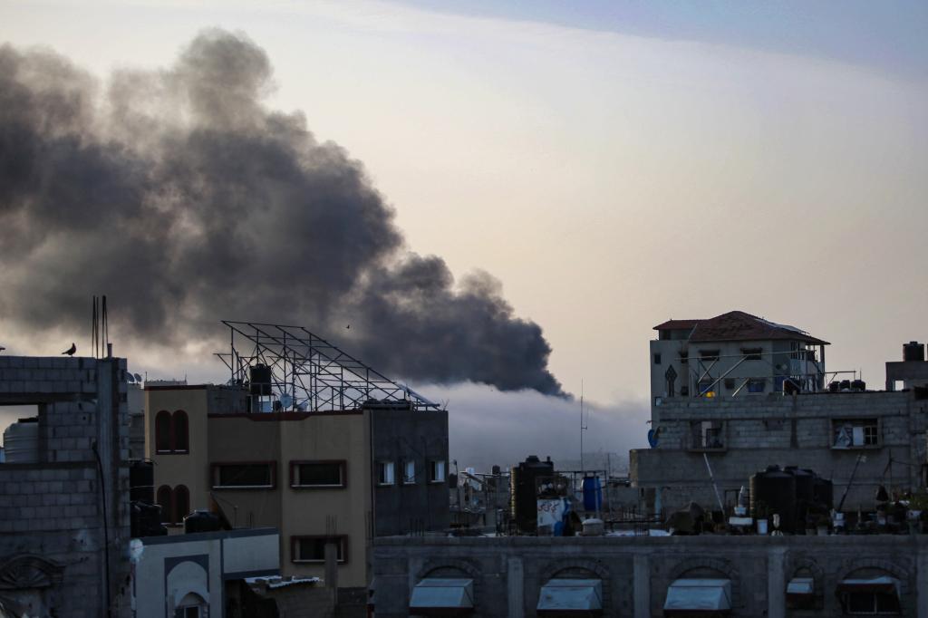 Smoke rises above building in Rafah.