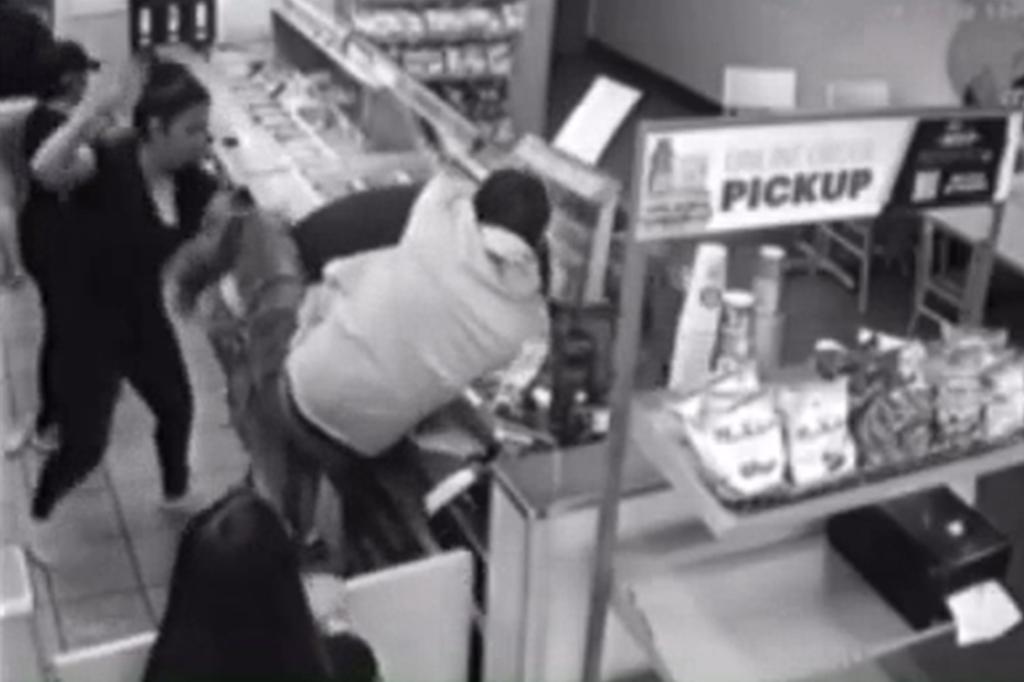 As Sandoval launched his attack, a quick-thinking customer rushed to the worker's aid and ripped the brute away from the woman.