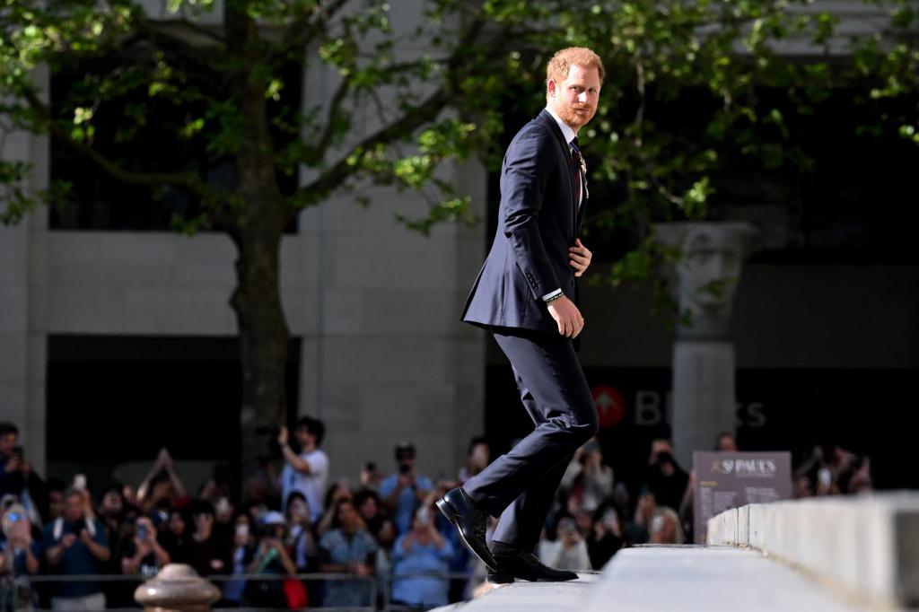 Prince Harry, Duke of Sussex, in a suit, at the tenth anniversary service of the Invictus Games in London, UK, on May 8, 2024.