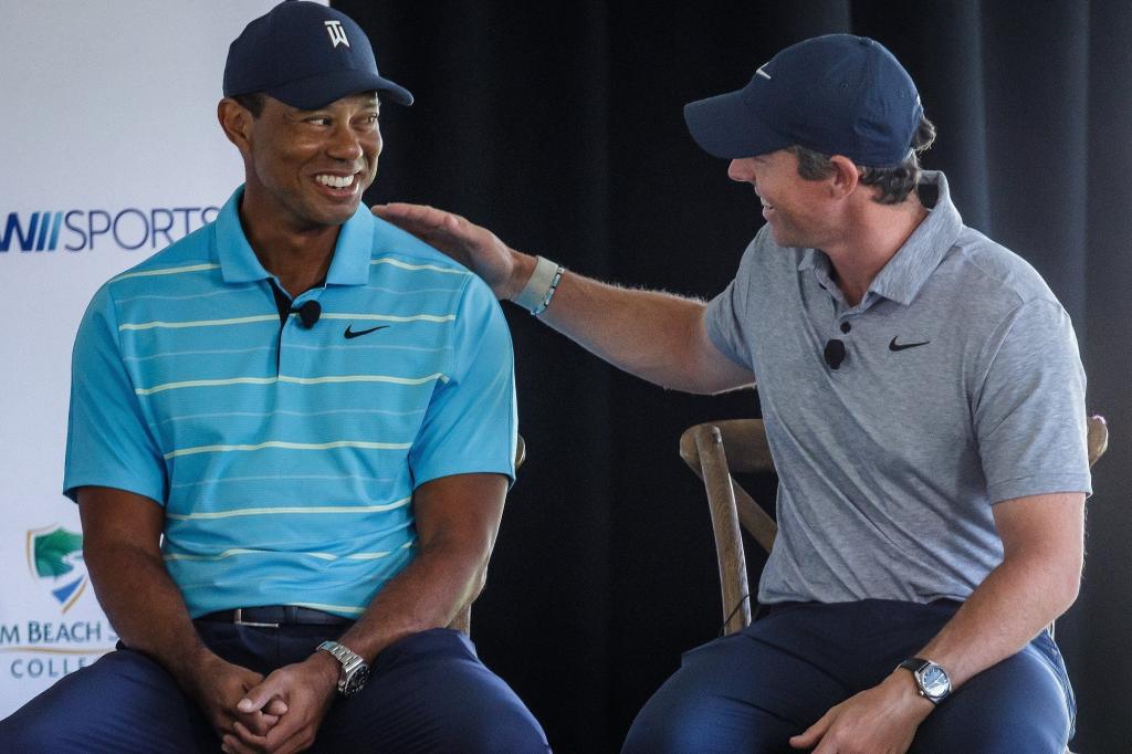 Tiger Woods and Rory McIlroy sitting together in 2023