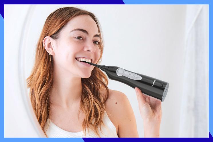 A woman brushing her teeth