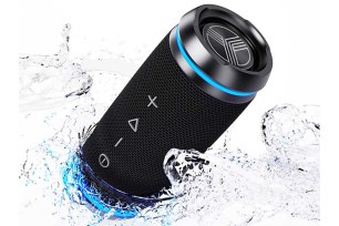 A black speaker with blue light emerging from water