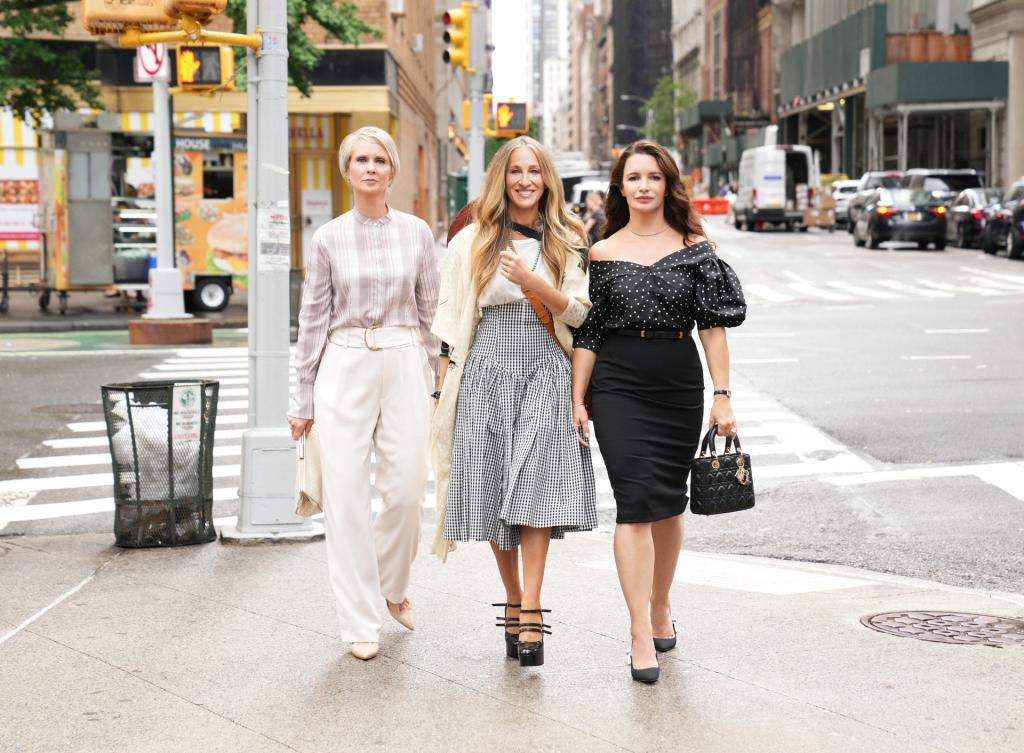 Cynthia Nixon as Miranda Hobbes, Sarah Jessica Parker as Carrie Bradshaw, and Kristin Davis as Charlotte York. 