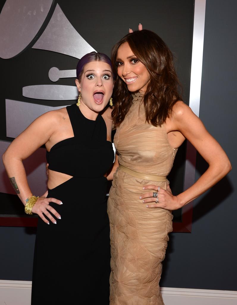 TV personalities Kelly Osbourne (L) and Giuliana Rancic attend the 55th Annual GRAMMY Awards.