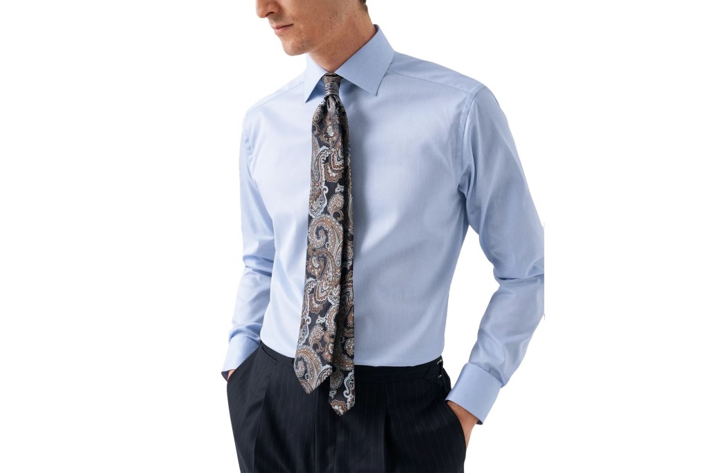 man in a blue shirt and tie