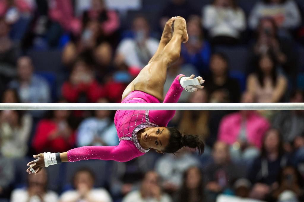 Simone Biles competes in the uneven bars event during the Core Hydration Classic at XL Center in Hartford, Connecticut, on May 18, 2024. 