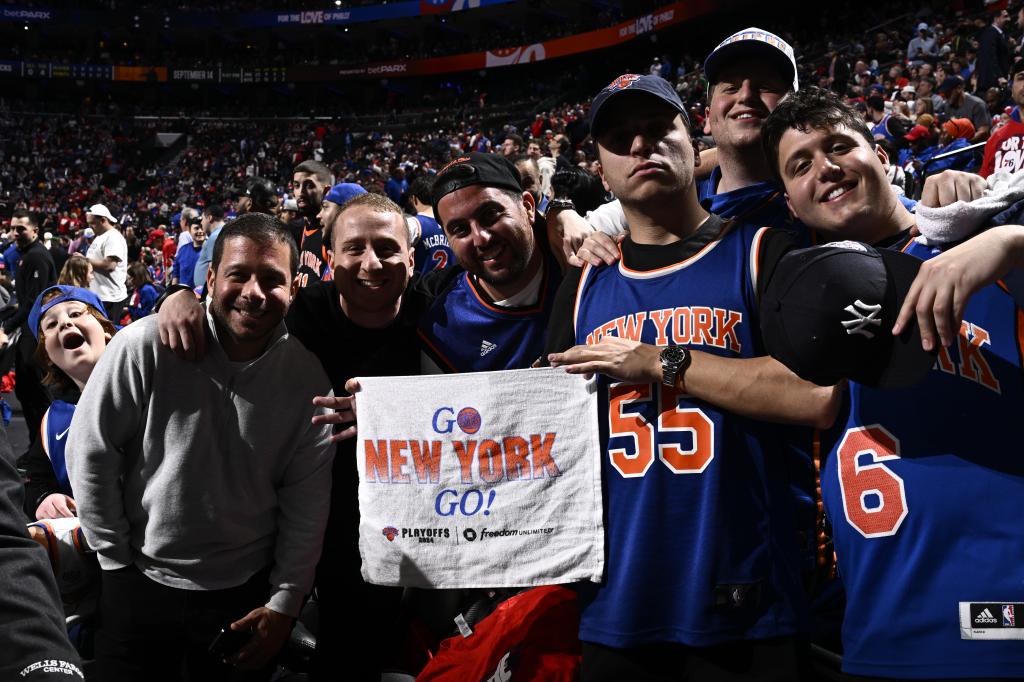 New York Knicks fans pose for a portrait during the game against the Philadelphia 76ers during Round 1 Game 3 of the 2024 NBA Playoffs 