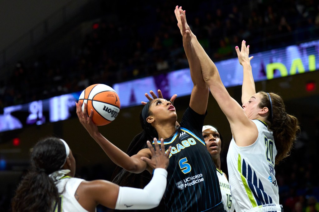 Angel Reese #5 of the Chicago Sky drives to the basket against the Dallas Wings during the first half at the College Park Center on May 15, 2024 in Arlington, Texas.