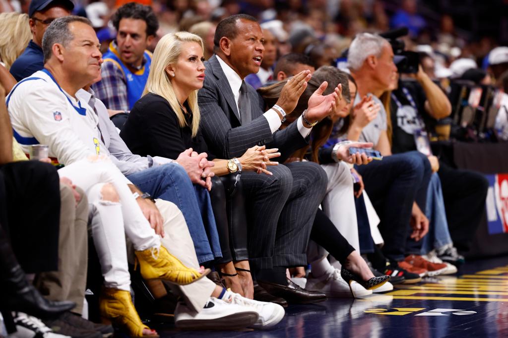 Jaclyn Cordeiro and Alex Rodriguez watch the Timberwolves' Game 7 win against the Nuggets on May 19, 2024.