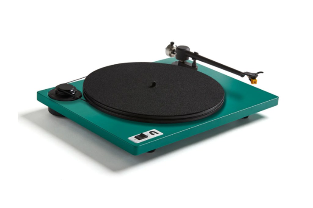 A record player with a black arm