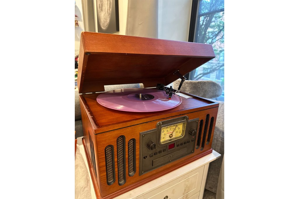 A vintage record player on a table