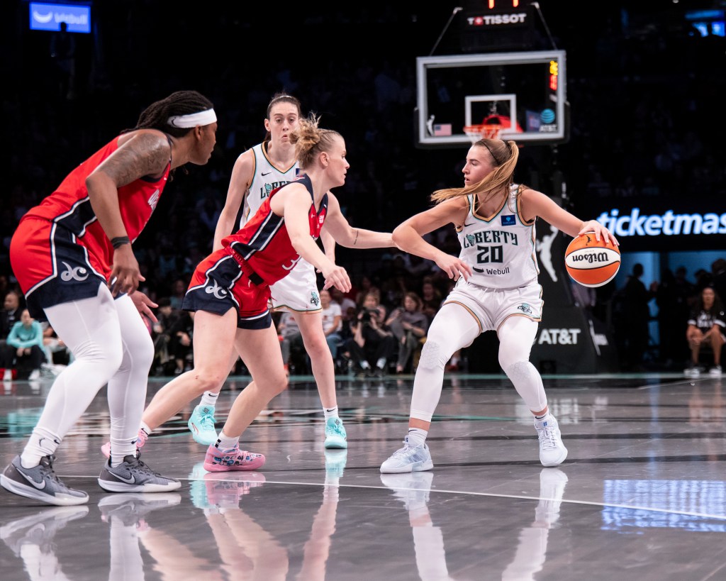 Sabrina Ionescu #20 of the New York Liberty handles ball against the Washington Mystics at Barclays Center 