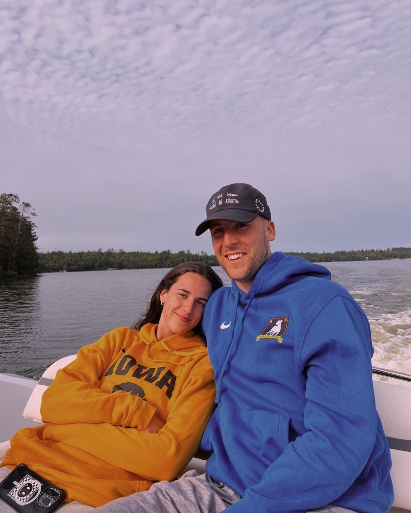 Caitlin Clark and Connor McCaffery on a boat.