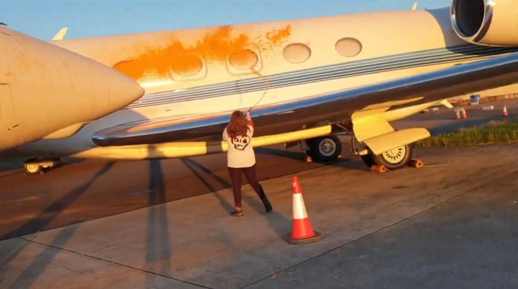 Two Just Stop Oil supporters have painted two private jets orange.