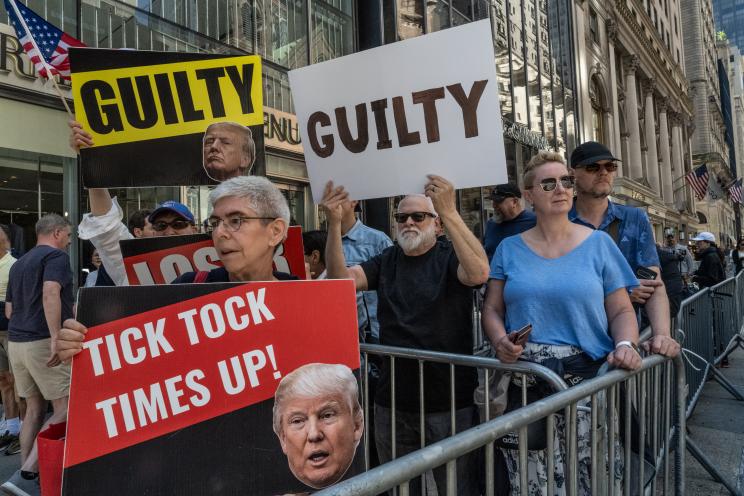 Crowds gathered in front of Trump Tower before a press conference by former President Donald Trump, after his conviction on all counts in a hush money trial, May 31, 2024.