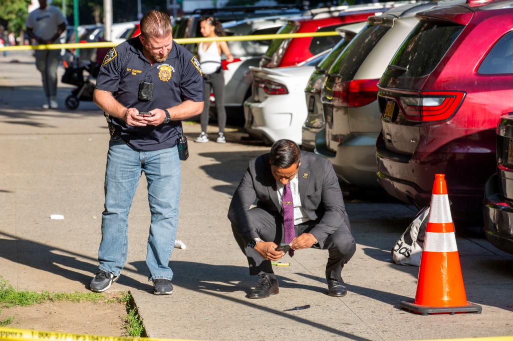 Officers noticed the suspect trying to stab people when they arrived.