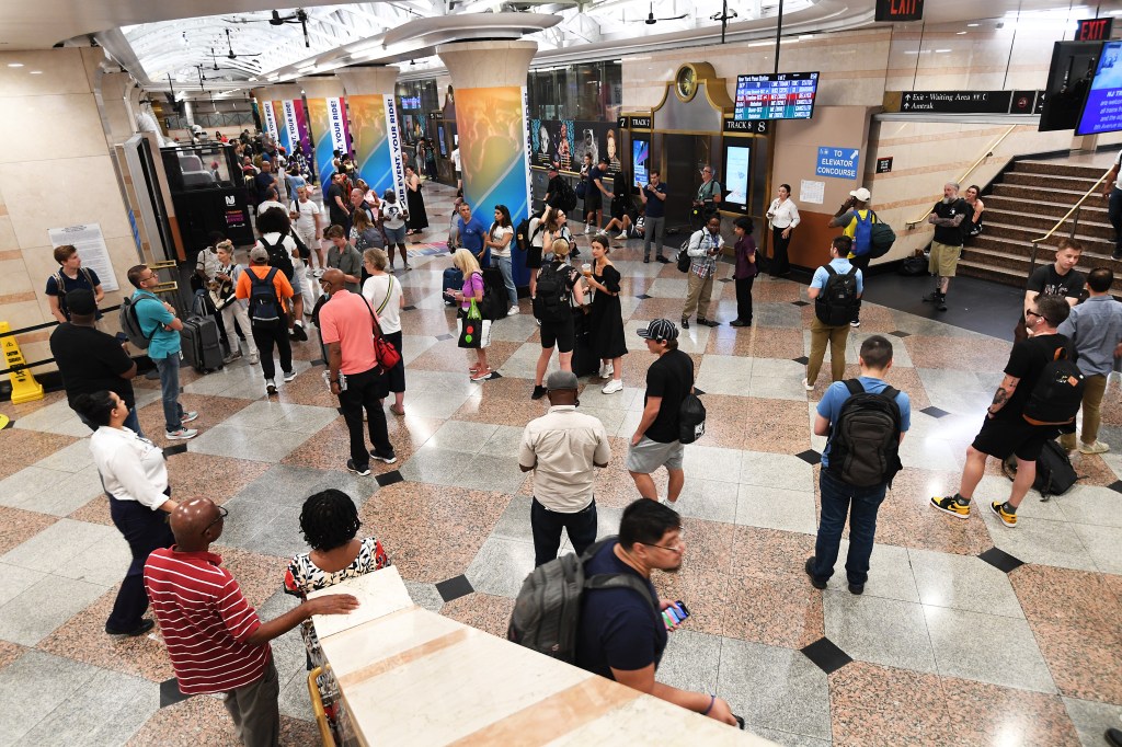 Travelers remain stranded inside PENN station as the NJ Transit system continues to have problems.
