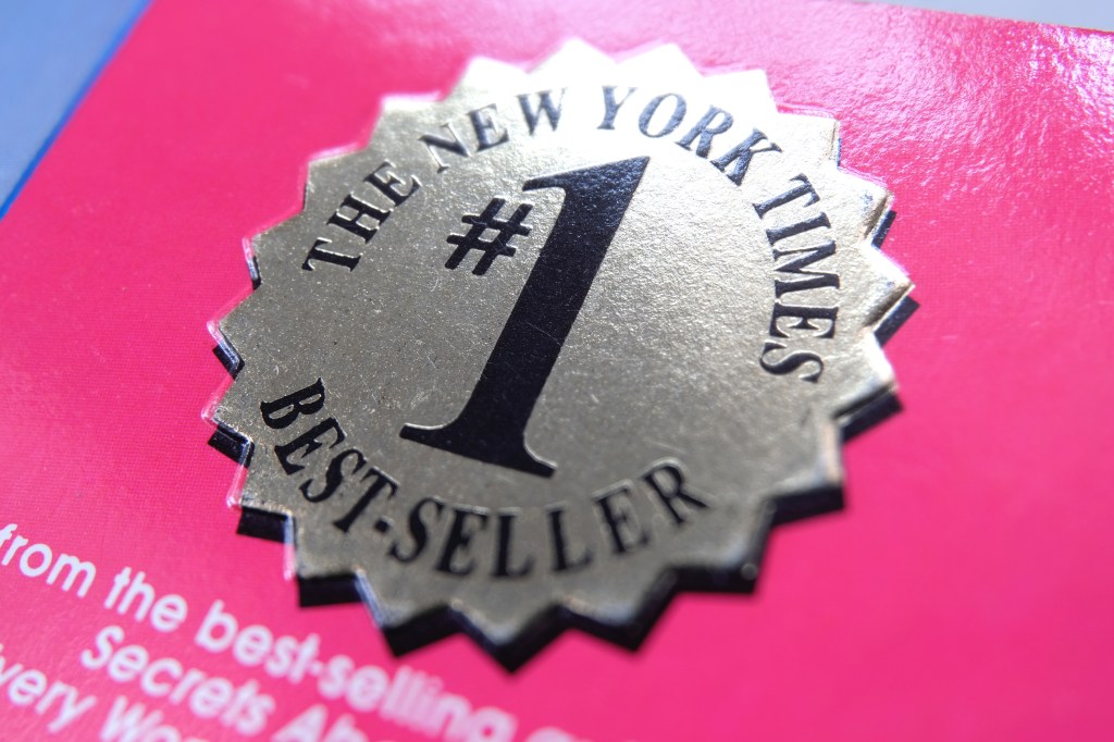 New York Times best seller medallion on a book