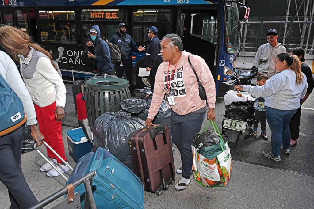 Migrants getting off a bus. 