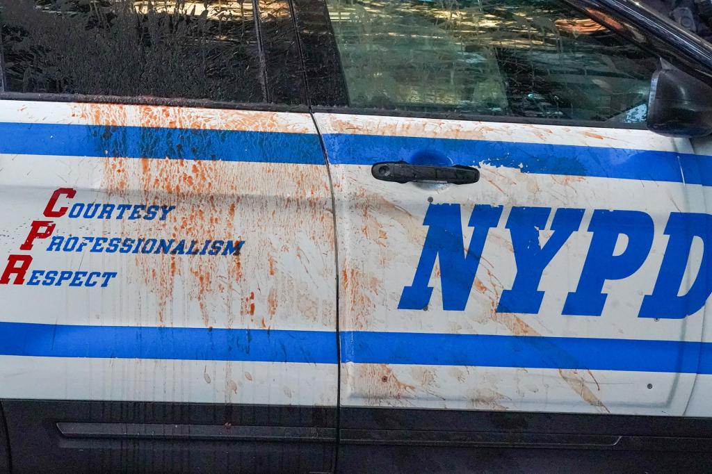 115 E 65st., Mhtn. Location of Palestinian Mission. Across this block; between Park and Lexington Ave., in the street and sidewalk, as well as onto parked NYPD car in front of 115 E 65st., red paint, rocks, and political flyers were scattered throughout. A tarp banner was folded and removed from scene. NYPD arrived and closed off block to investigate.