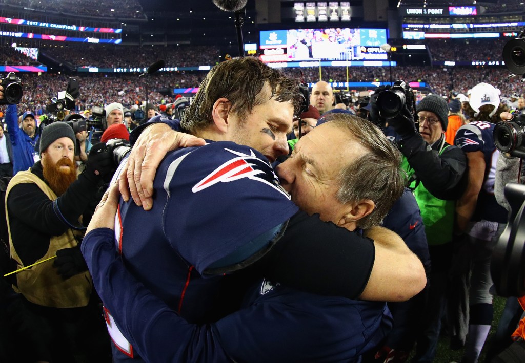 Tom Brady and coach Bill Belichick celebrating after winning the AFC Championship game against the Jacksonville Jaguars at Gillette Stadium in 2018