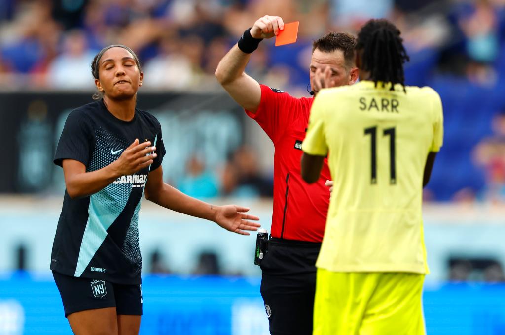 Gotham FC midfielder Yazmeen Ryan (18) reacts after receiving a red card during the first half of a soccer game against the Washington Spirit on Sunday.