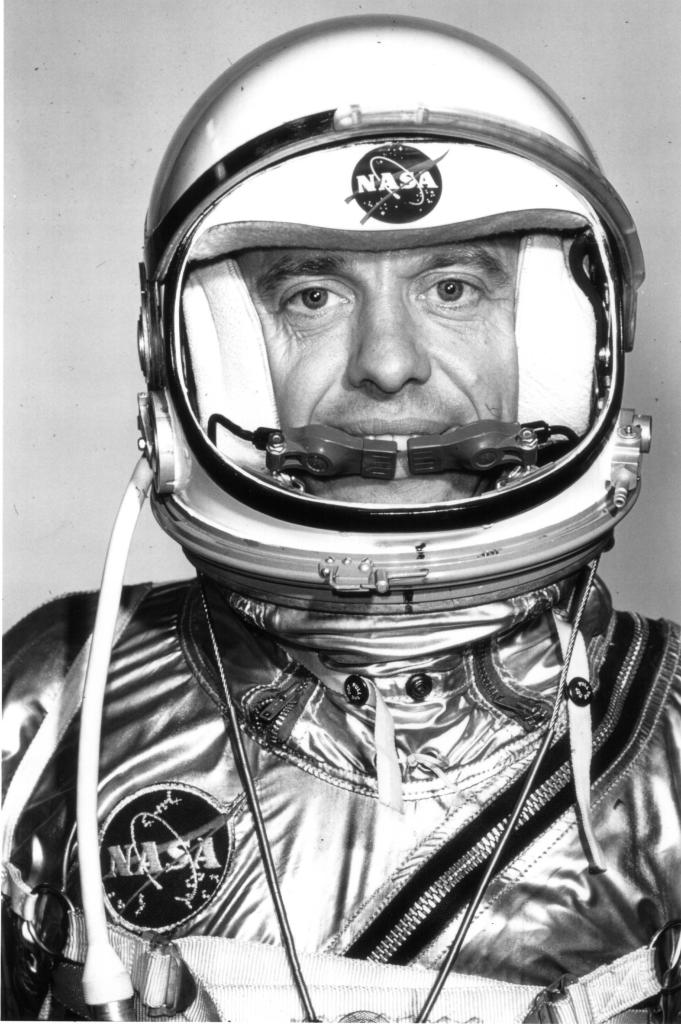 Alan B. Shepard in spacesuit and helmet.