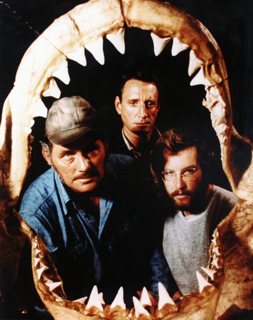 A "Jaws" movie poster with Dreyfuss, Shaw and Schneider. 