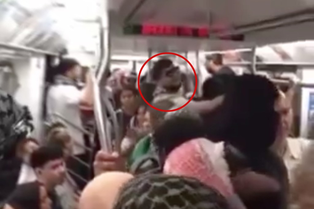 Anti-Israel man on NYC subway tells Zionists to get off the train.