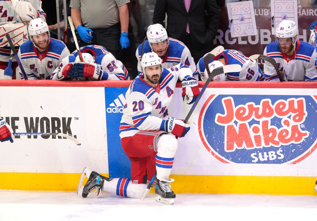 Chris Kreider kneels in front of the Rangers bench during their Game 6 loss to the Panthers on Saturday.
