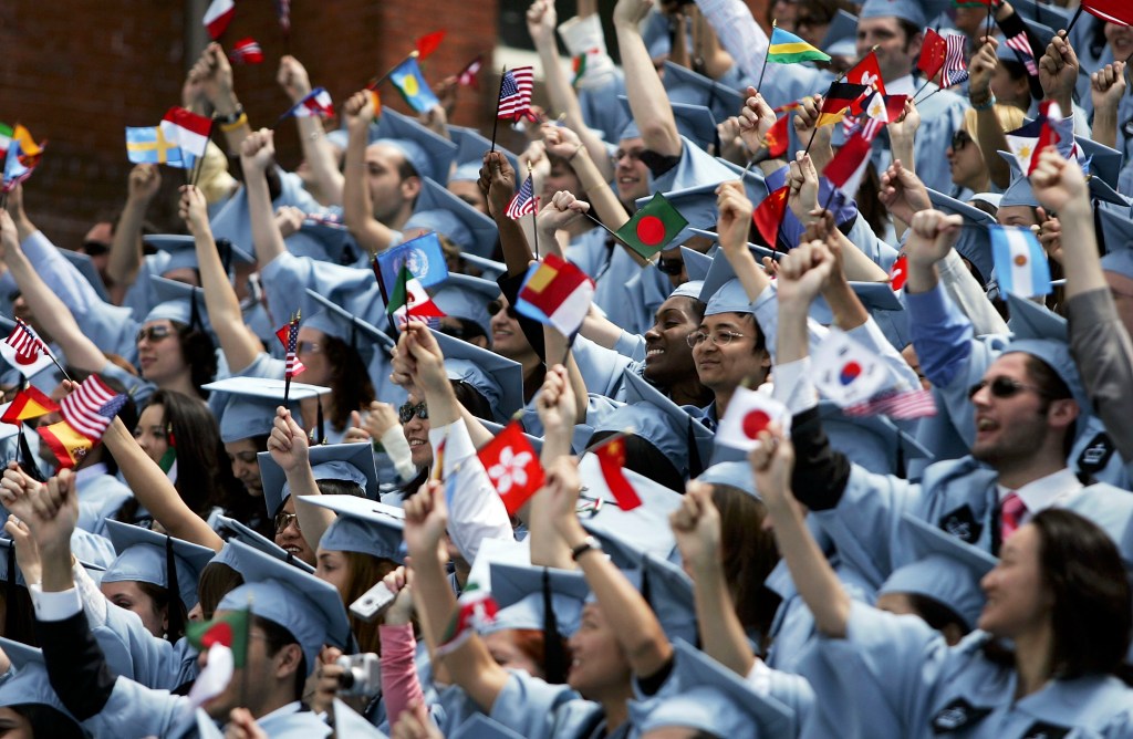 Students cheer during commencement ceremonies at Columbia University May 18, 2005 in New York City. This is the 251st class to graduate from Columbia. 