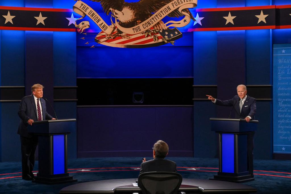President Donald Trump (L) and Democratic Presidential candidate and former US Vice President Joe Biden exchange arguments during the first presidential debate at Case Western Reserve University and Cleveland Clinic in Cleveland, Ohio, on September 29, 2020.