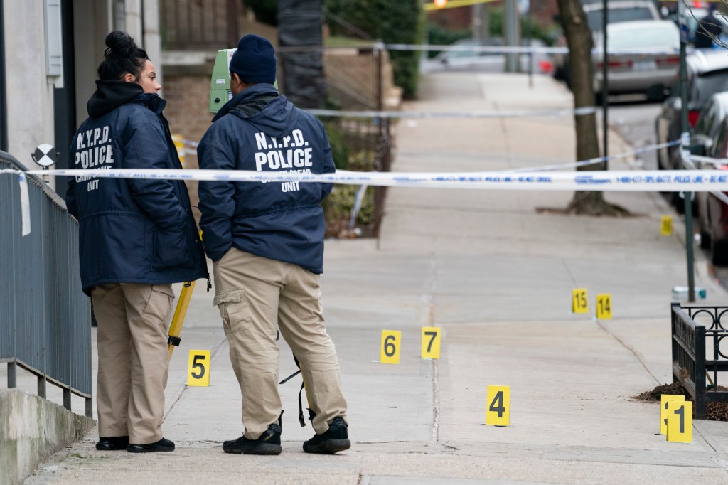 NYPD officers at the crime scene.