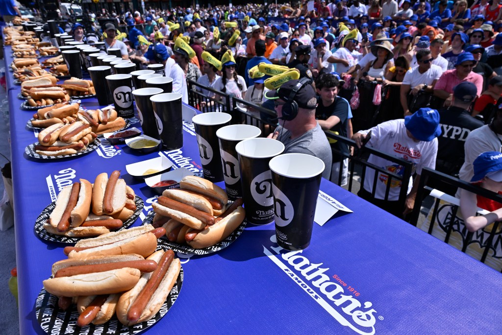 Plates of hot dogs lined up at the Nathan's event.