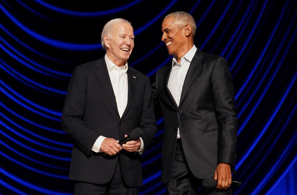 Biden and former President Barack Obama share a laugh during a star-studded campaign fundraiser at the Peacock Theater in Los Angeles.