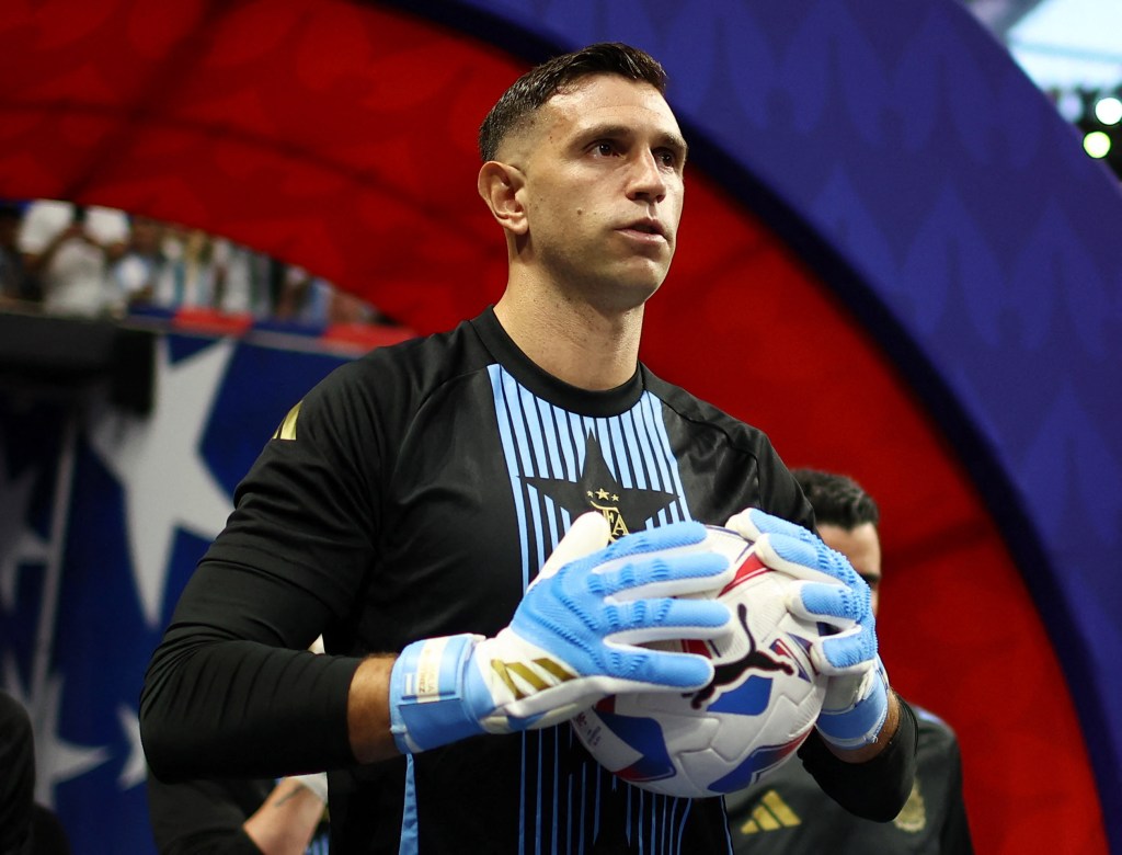 Emiliano Martinez of Argentina warming up before the Copa America 2024 soccer match against Canada at the Mercedes-Benz Stadium in Atlanta, Georgia.